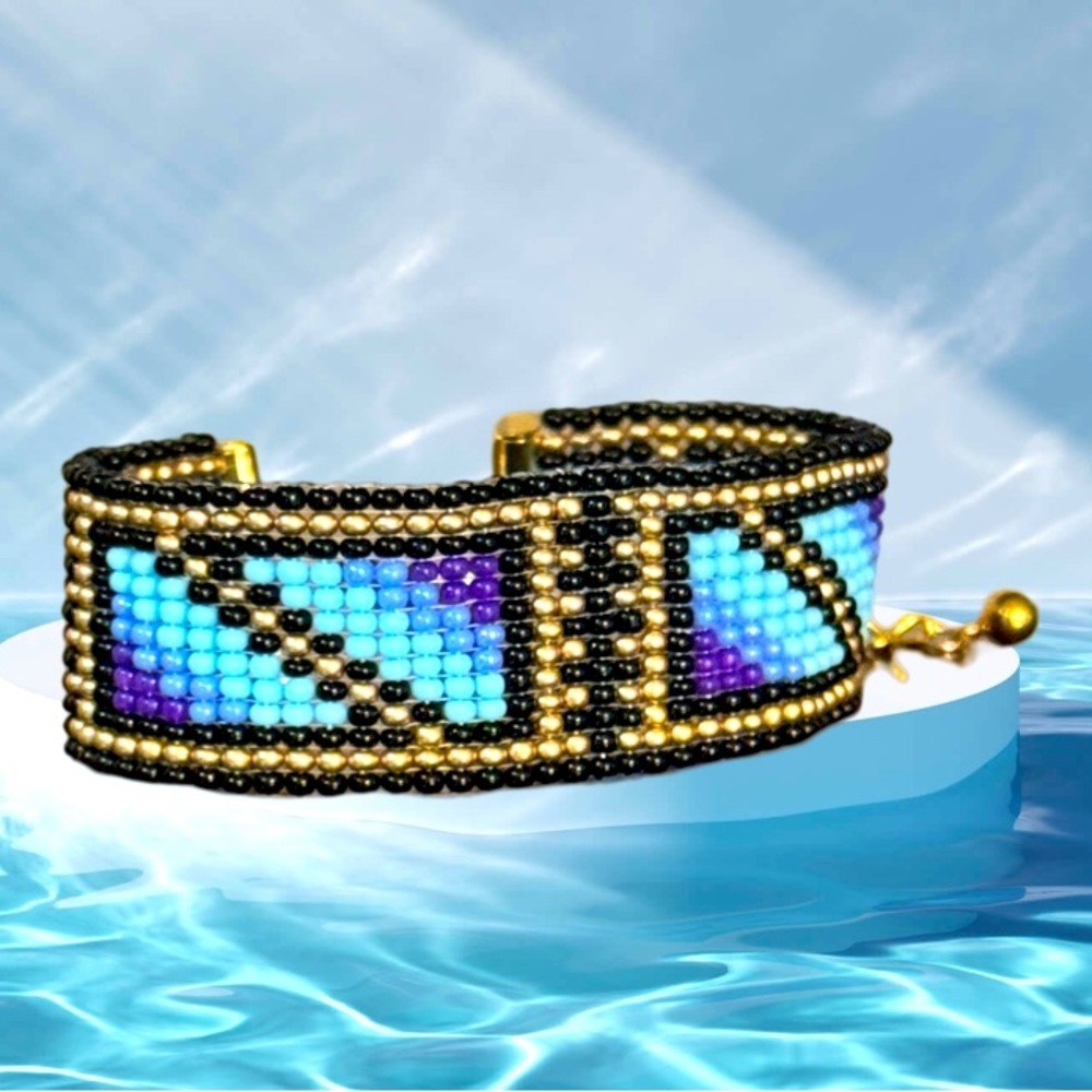 Hand crafted beaded blue geometric Native American inspired adjustable bracelet